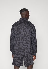 Puma ENERGY FULL ZIP JACKET - Treniņjaka - puma black