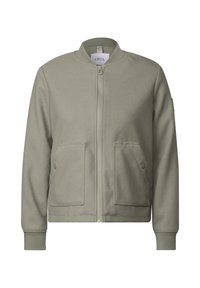 Un sweat-shirt veste vert olive avec fermeture à glissière, col rond, et deux poches avant. Fabriqué en matériau doux et texturé.