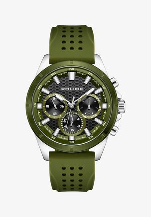 Reloj con correa de silicona verde, esfera hexagonal negra, acentos plateados y tres subesferas que indican la fecha y el día. Caja de acero inoxidable pulido.