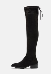 Botas negras sobre la rodilla de suave ante, con punta redonda, tacón grueso y cordón ajustable en la parte superior para un mejor ajuste.