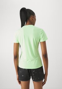 adidas Performance ADIZERO TEE - Spordi T-särk - green spark