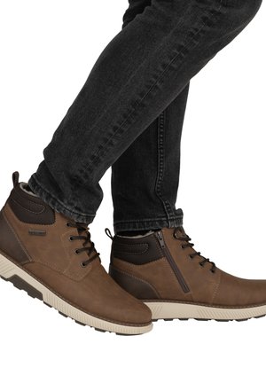 Rieker Bottines à lacets - braun