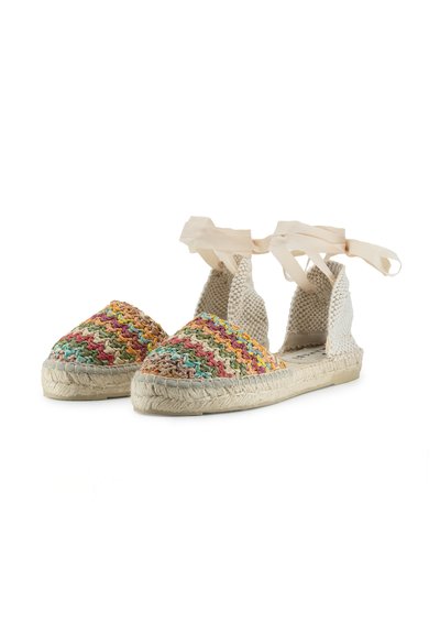 Espadrillas intrecciate con motivo multicolore sulla punta, parte superiore in tela beige e lacci alla caviglia. Suola in juta con finitura testurizzata.