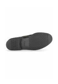 Semelle de chaussure noire avec des motifs texturés, des bords arrondis et un logo. Fabriquée en caoutchouc et présente divers motifs d'adhérence pour une meilleure traction.