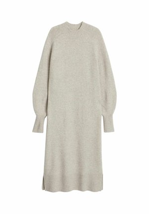 Lysegrå strikket kjole med rund halsudskæring, ribkant ved ærmer og kant. Har lange ballonærmer og sidesplitter nederst.