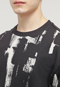 YOURTURN Felpa - black