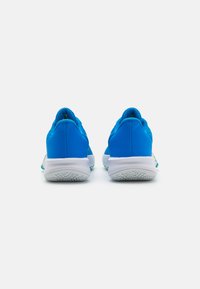 Blue athletic shoes with a breathable mesh upper, cushioned white midsole, and textured rubber outsole. Features a contrasting accent stripe.