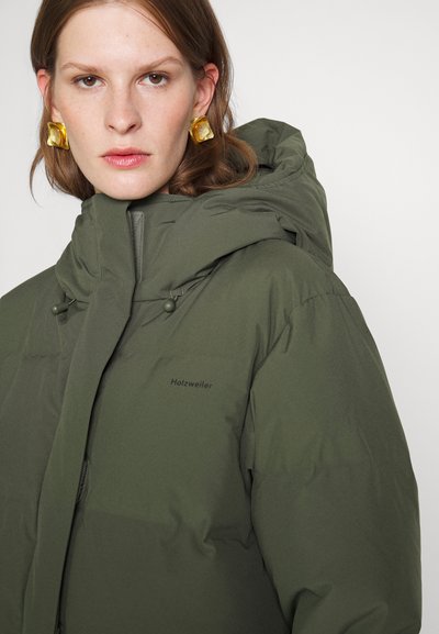 Olive green puffer jacket featuring a high collar, adjustable hood, and logo detail on the chest. Soft, smooth texture with quilted design.