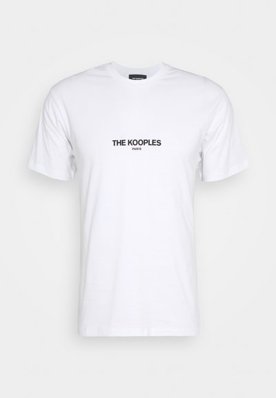 Tricou din bumbac alb, cu guler rotund și mâneci scurte. Text negru imprimat "THE KOOPLES PARIS" centrat pe față.