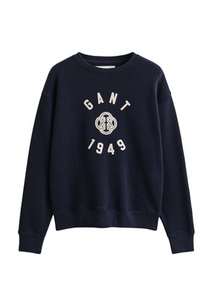 Sweat-shirt bleu marine col rond avec "GANT 1949" et un logo circulaire brodés en blanc sur la poitrine.