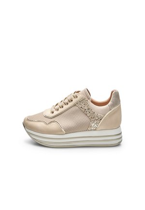 Beige women's sneaker with lace-up front, perforated and glitter accents, and thick striped platform sole.