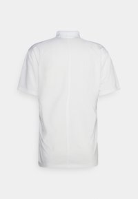 Nike Performance Polotričko - white/black