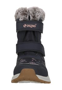 Marineblaue Winterstiefel mit pinkem Schneeflockenmuster, Kunstfellkragen und zwei verstellbaren Klettverschlussriemen. Gummisohle mit rutschfester Struktur.