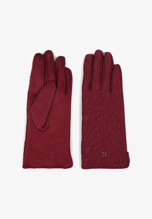 Burgundy gloves made of soft material featuring one smooth surface and one embossed with a pattern of letters. Trimmed edges and logo detail.