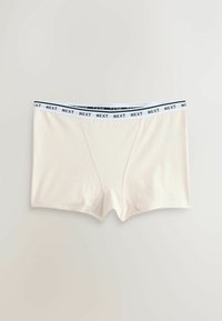 Boxers beige pour hommes avec ceinture élastique blanche comportant le logo "NEXT" répété en texte noir, posés à plat sur un fond clair.