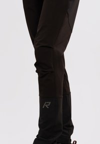 Rukka HIGHWAIST WARM - Friluftsbyxor - schwarz
