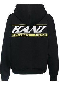 Sort hættetrøje med en stor hvid og gul grafik på ryggen samt teksten "KANI NIGHT RIDER EST. 1989". Blødt, tekstureret stof.