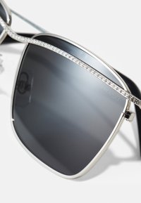 Swarovski Sončna očala - black
