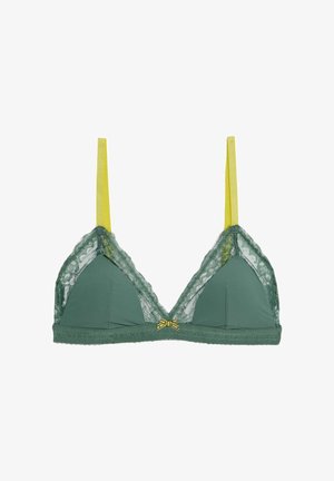 Groene kant en stoffen driehoekige bralette met gele banden en een decoratieve strik in het midden. Golvende randen langs de zoom.