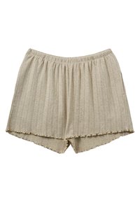 Bež kratke hlače s rebrastim uzorkom i elastičnim pojasom, s resastim rubom i teksturiranim uzorkom. Tkanina izgleda mekano i lagano.