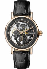 Mekanisk klocka med en transparent skelettskiva. Fall i roséguld-ton, svart läderarmband med krokodilprägling. Anmärkningsvärda intrikata kugghjul.