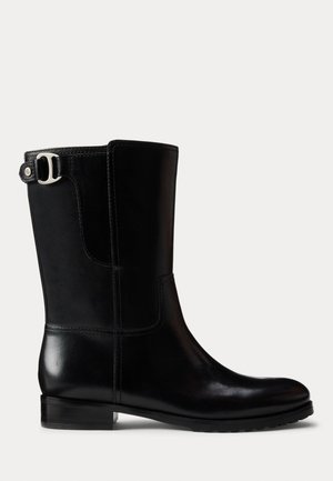 Black leather ankle boots featuring a rounded toe, smooth finish, and a silver buckle detail at the top. Low block heel and durable sole.