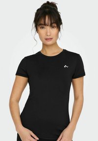 ONLY Play ONPCARMEN ON REG NOOS - T-shirt till träning - black