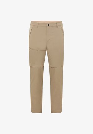 Pantalon convertible beige avec jambes zippées amovibles, poches latérales zippées et passants pour ceinture, conçu pour une utilisation extérieure polyvalente.