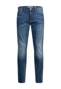 Jeans i middels blå med falming detaljer, klassisk fem-lomme design, glidelås og slim fit. Glatt tekstur og søm-detaljer.