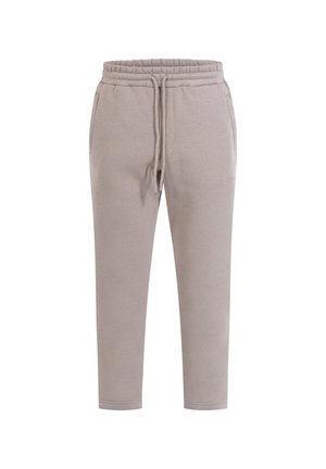 Pantalons de survêtement gris clair en tissu doux, dotés d'une taille élastique avec cordon de serrage, de poches latérales et de chevilles fuselées.
