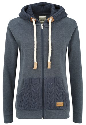 Marineblå zip-up hettegenser med en teksturert strikket lomme, kontrasterende snorer og lærdetaljer. Mykt stoff med ribbestrikkede mansjetter og hettens foring.