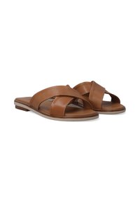 Brune læderslidesandaler med krydsremdesign, flad sål og minimalistisk form. Subtil tekstur fremhæver det overordnede udseende.