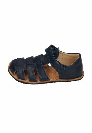 Navy blue leather children's sandal with a cork sole, open toe design, and adjustable hook-and-loop strap closure.