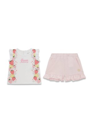 Haut blanc sans manches avec imprimés fraises et fleurs et short rayé rose à volants avec taille élastique pour petite fille.