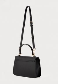 Black leather handbag with a structured shape, top handle, adjustable shoulder strap, gold-tone hardware, and a flap closure.