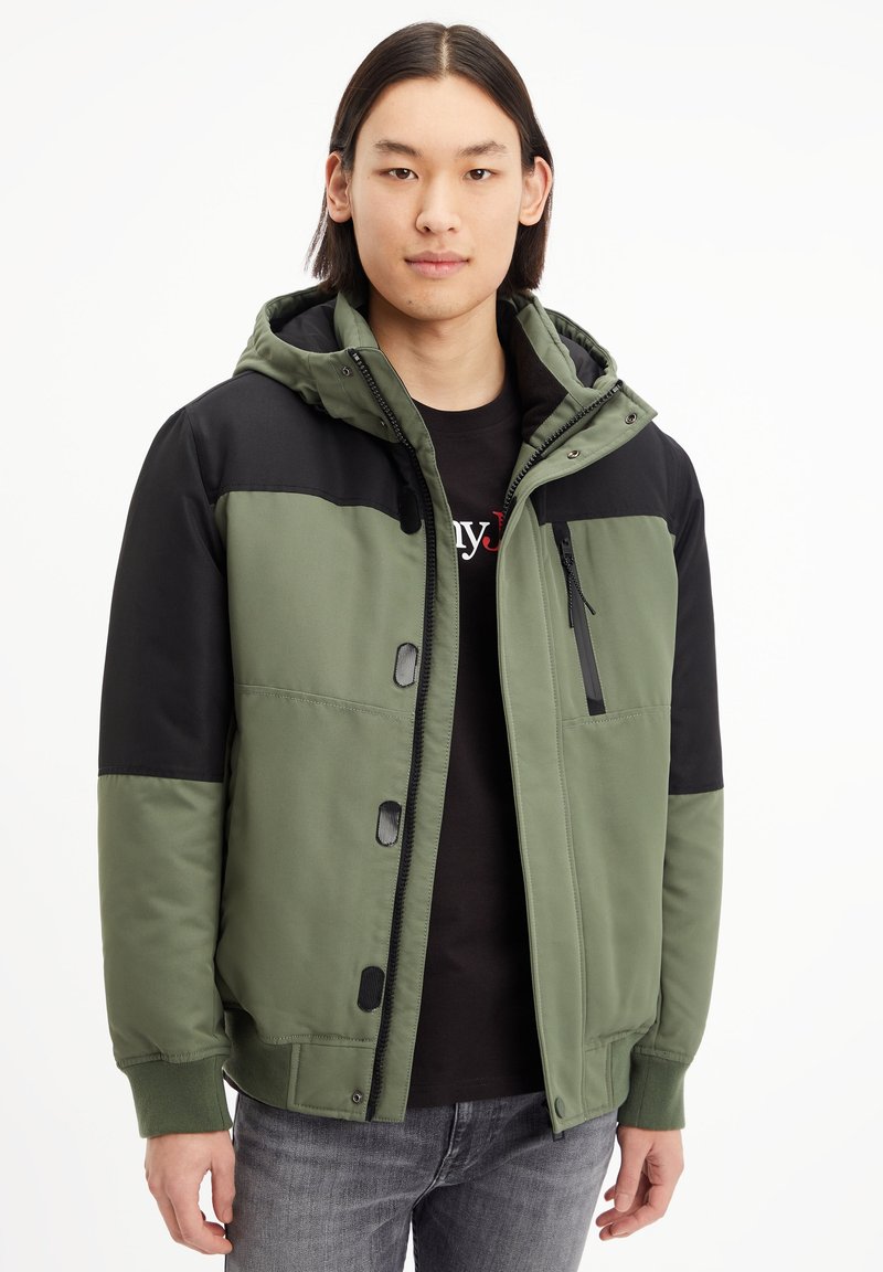 Tommy Jeans COLORBLOCK TECH Winterjacke avalon green/grün Zalando.de