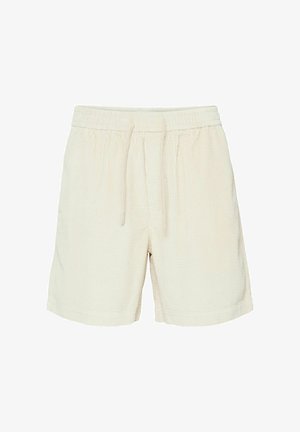 Shorts beige texturés avec une taille élastique et un cordon de serrage. Dotés de poches latérales et d'une coupe décontractée. Matière douce et légère.