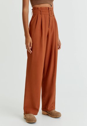 Broek - mottled orange