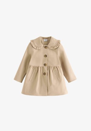 Beige toddler frakke med lange ærmer, flæset Peter Pan-krave, forreste knaplukning, indsnævring ved taljen og to sidelommer.