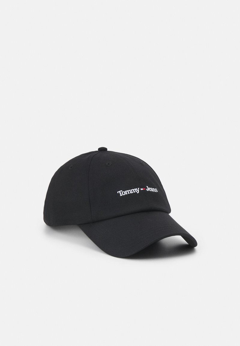 Casquette de baseball noire avec visière incurvée et logo "Tommy Jeans" brodé en blanc et rouge au centre devant.