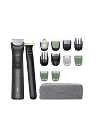 Kit di toilettatura Philips con due regolatori: grigio scuro e nero, diversi pettini di attacco in verde e nero, oltre a una pochette grigia per il trasporto.