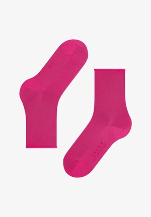 Pink ankle socks made of smooth material, featuring a seamless design and a reinforced heel. The brand name "FALKE" is printed on the side.