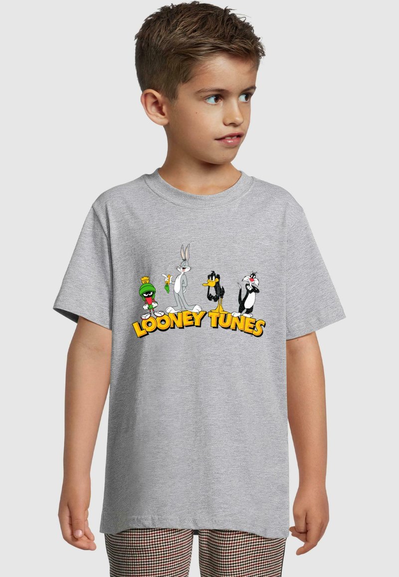 Gray cotton t-shirt featuring printed Looney Tunes characters: Marvin the Martian, Bugs Bunny, Daffy Duck, Sylvester, with yellow text.