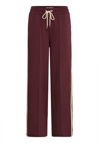 Pantaloni jogger bordeaux realizzati in tessuto morbido, con una vestibilità comoda, cintura elastica, chiusura con cordino e strisce laterali color crema.