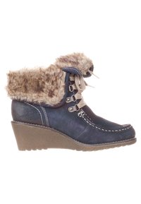 Bottes compensées bleu marine avec col en fausse fourrure, tige en cuir, lacets décoratifs et coutures contrastantes. Semelle en caoutchouc texturé pour une meilleure adhérence.