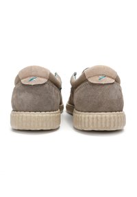 Gray suede shoes with round backs, beige accents, textured rubber soles, and light blue stitching on the heel.
