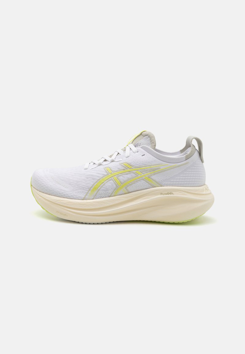 White running shoe with a textured upper, yellow accents, and a thick, cushioned sole. Features a rounded toe and rear pull tab.