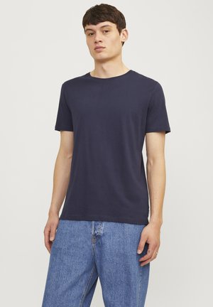 T-shirt à manches courtes bleu marine en coton doux, avec un col rond classique et une coupe décontractée.