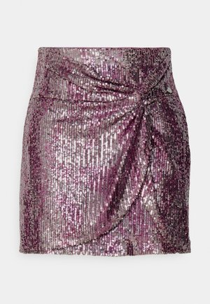 Sequin mini skirt featuring a purple and silver gradient with a draped front design and a fitted silhouette. Smooth texture and shimmering finish.