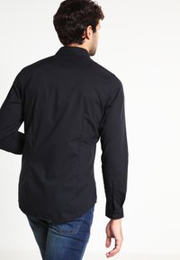 Seidensticker SLIM - Camicia elegante - schwarz